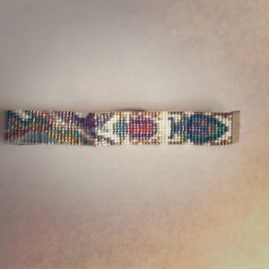 Julie Rofman Tahiti bracelet with scarab.